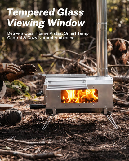 Outdoor fire stove with a tempered glass viewing window showing a bright flame, set in a wooded environment with a person kneeling nearby. Text overlay reads &